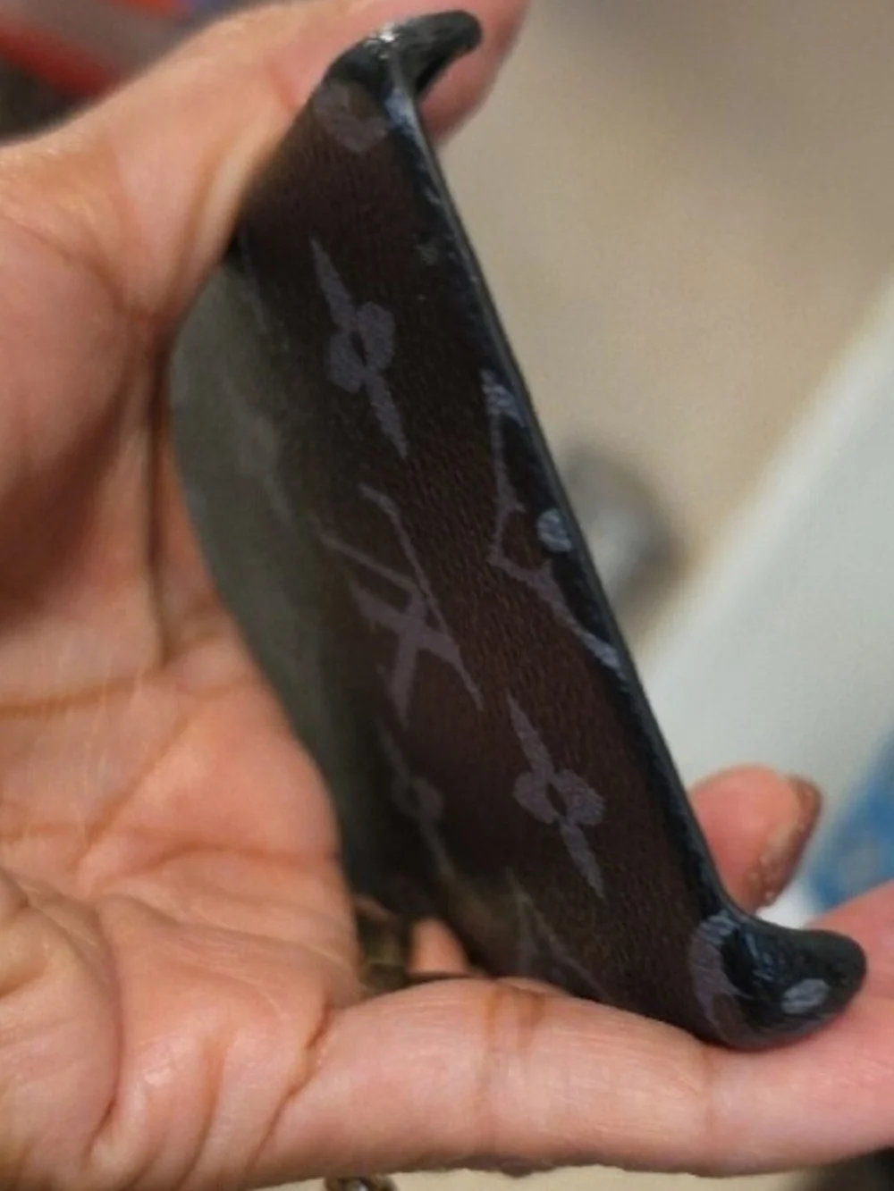 Phone Case In Black And Gray Pattern Fits an S26 Ultra Phone.